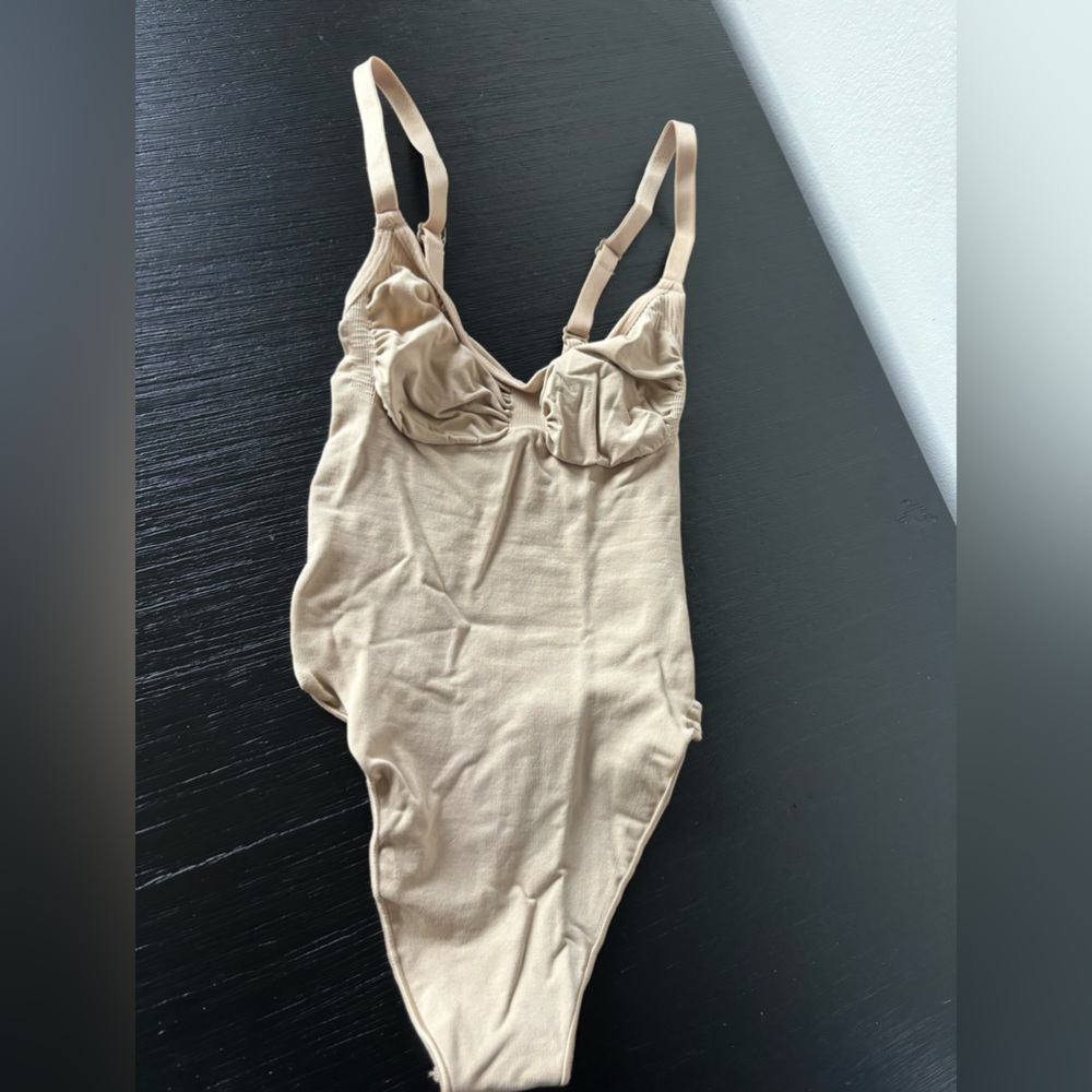Skims Seamless Sculpt Thong Bodysuit in Clay
